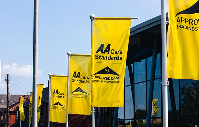 AA Cars Standards banners outside car dealership